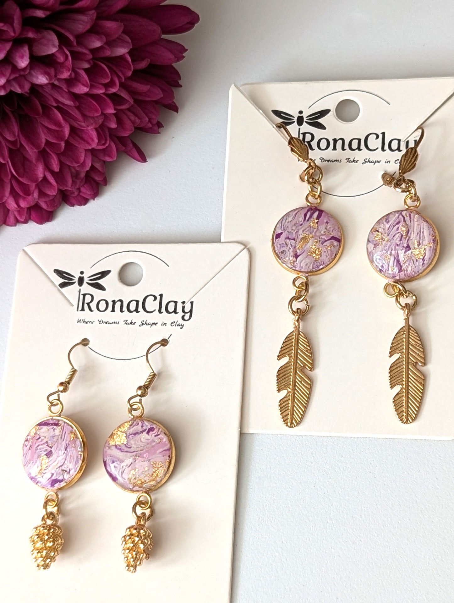 Marbled purple design with gold feather and Pinecone charms -Handmade Polymer Clay Earrings