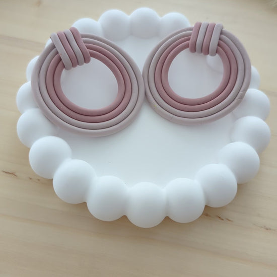 Showcasing RonaClay’s Modern Collection: Bold, trendy, and handmade polymer clay earrings in various designs, highlighting their lightweight and stylish appeal. Perfect for everyday wear or special occasions.