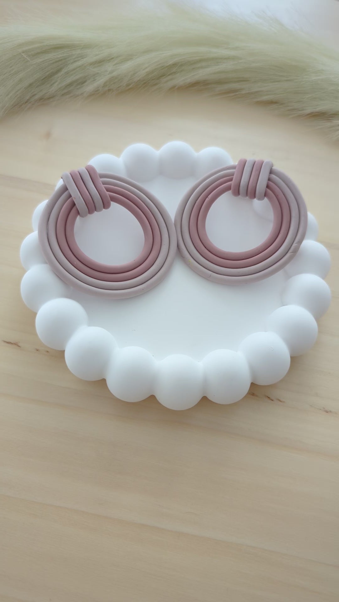 Showcasing RonaClay’s Modern Collection: Bold, trendy, and handmade polymer clay earrings in various designs, highlighting their lightweight and stylish appeal. Perfect for everyday wear or special occasions.